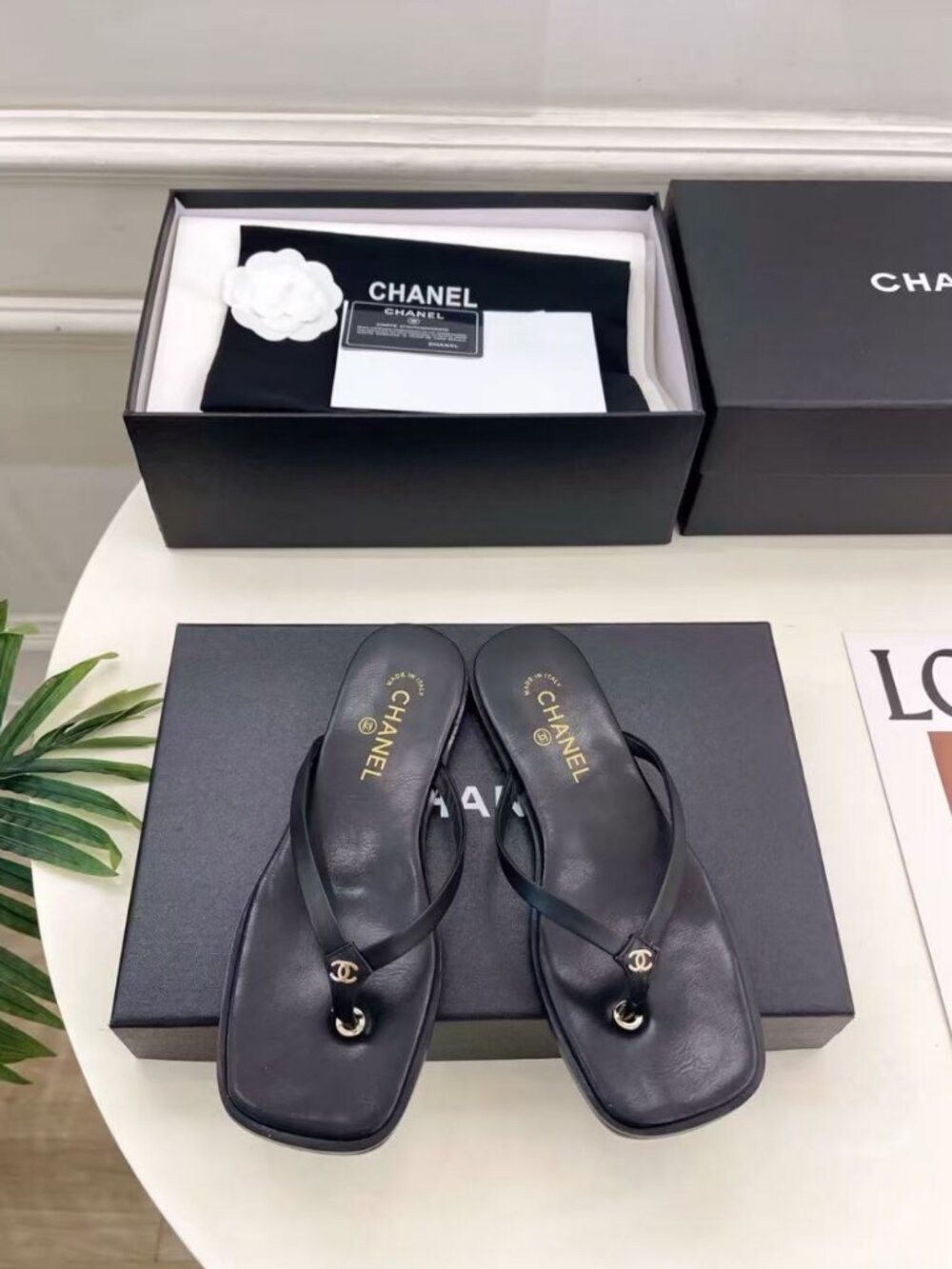 CHANEL black square-toe flat flip flops